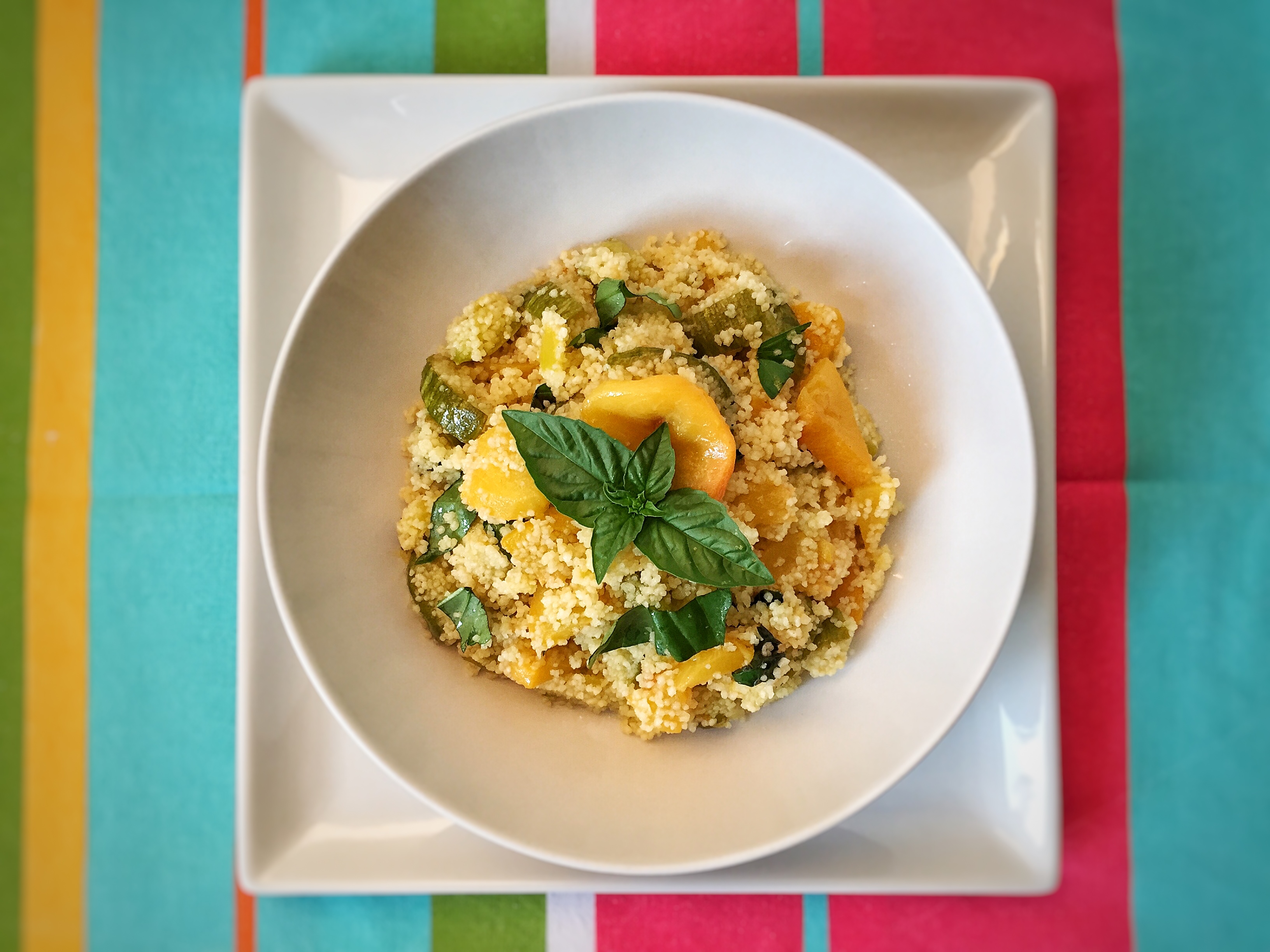 Cous cous con zucchine e pesche